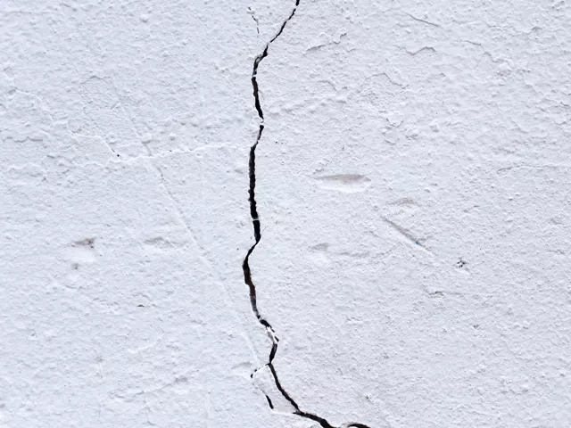A long crack running down a wall, a common sign of subsidence